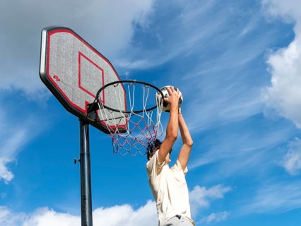Basketball Jump with the ball to the basket and net