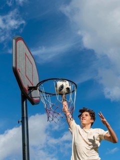 Basketball Jump with the ball to the basket and net