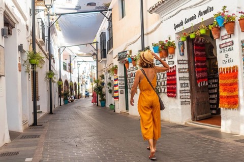 A tourist in the white houses walking and visiting the municipality of Mijas in Malaga. Andalusia