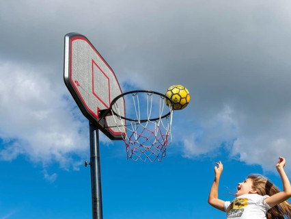 Basketball Jump with the ball to the basket and net