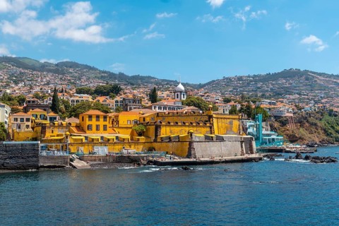 View of the seaside fort of Forte de Sao Tiago on Funchal beach in summer. Madeira