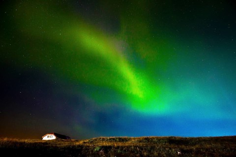 Green lights of the beautiful Northern Lights on the Reykjanes peninsula in southern Iceland