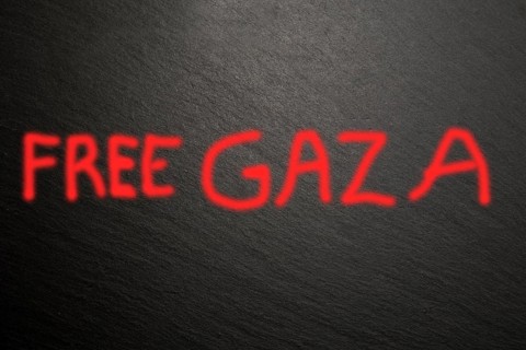 On black slate is written in red paint