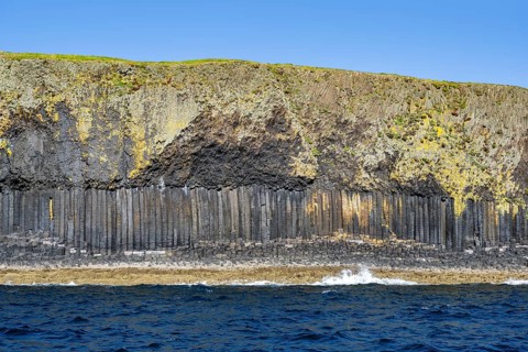 Detail of the uninhabited rocky island of Staffa with the polygonal basalt columns