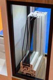 Cross section of aluminum window profile for plastic double-glazed windows. Mid shot