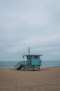 The beautiful blue lifeguard house on the coast of Malibu