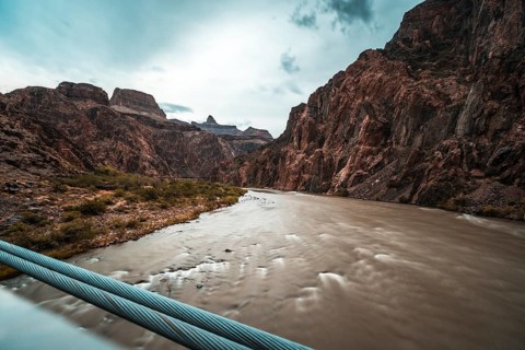 Long exposure on a cloudy afternoon of the Colorado River on the Bright Angel Trailhead route in the Grand Canyon. Arizona