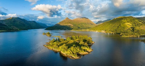 Aerial panorama of the western part of Loch Leven with the historic island of Eilean Munde