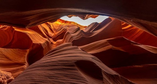 The beautiful curves in the stones of Lower Antelope and the blue sky above in Arizona. United States