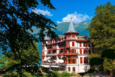 The Historical Grandhotel Giessbach on the Mountain Side in Bernese Oberland