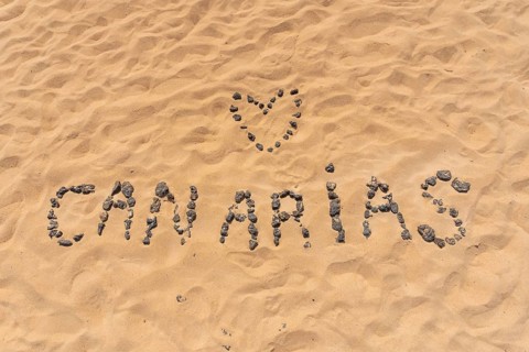 I love the Canary Islands with black stones on the beach of the dunes of the Natural Park of Corralejo