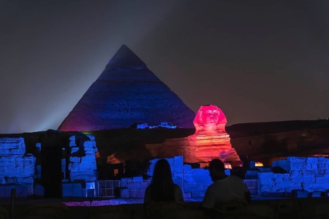 Sound and light show at the beautiful pyramids and sphinx of Giza. Night in the city of Cairo. Africa