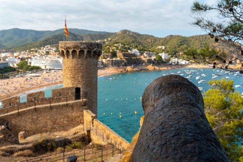 Beautiful war cannon in the castle of Tossa de Mar in summer