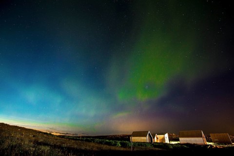 Green lights of the beautiful Northern Lights on the Reykjanes peninsula in southern Iceland