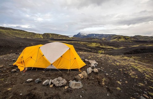 A yellow tent at the Landmannalaugar refuge for trekking. Iceland