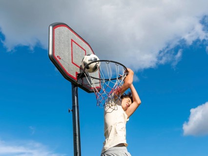 Basketball Jump with the ball to the basket and net