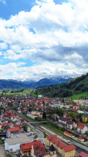 Aerial view of Immenstadt im Allgaeu with a view of the Alps. Immenstadt im Allgaeu
