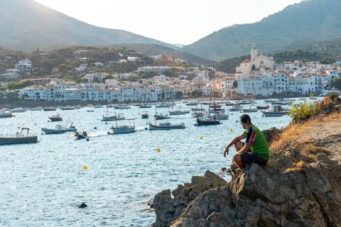 A young tourist on summer vacation in Cadaques by the sea