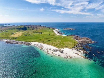 Aerial view of the sandy White Strand of the Monks on the northern part of the Isle of Iona