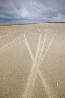 Traces of beach sailors in the sandy beach