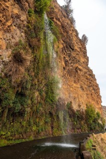 Waterfall that falls on the road called Anjos Waterfall