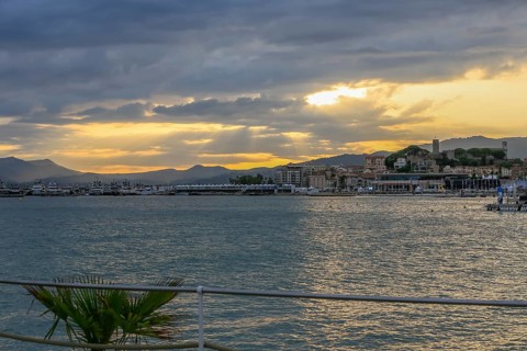 View from the Croisette in the evening on the old town and the Palais des Festivals