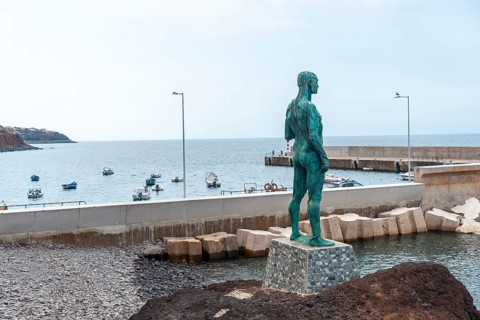 Sculpture on the Praia do Cais in the village of Paul do Mar in eastern Madeira. Portugal
