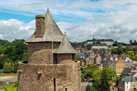 Interior of the castle of Fougeres and the city in the background. Brittany region
