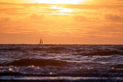 Sunset on the beach of De Panne