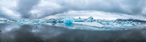 Beautiful icebergs on Jokulsarlon Ice Lake in the golden circle of southern Iceland on a cold August morning