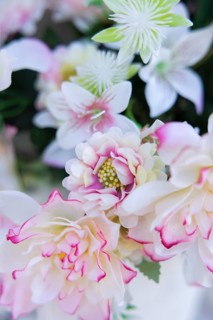 Arrangement with artificial flowers in a cemetery
