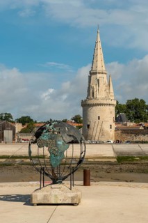 The beautiful entrance with the towers of the fort in La Rochelle. Coastal town in southwestern France