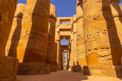 Columns with hieroglyphs inside the temple of Karnak