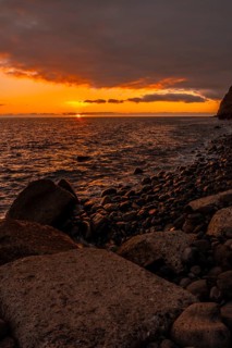 Orange sunset on the beach of Puerto de Tazacorte on the island of La Palma