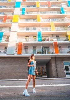 Girl with a skirt enjoying the city in summer