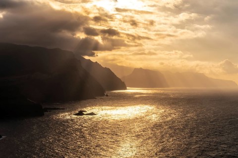 View from Ponta de Sao Lourenco of the cliffs of the island at sunset
