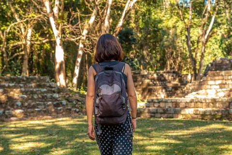 A young woman enjoying the temples of Copan Ruinas. Honduras