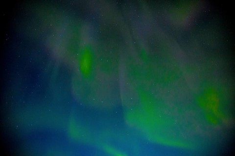 Green lights of the beautiful Northern Lights on the Reykjanes peninsula in southern Iceland
