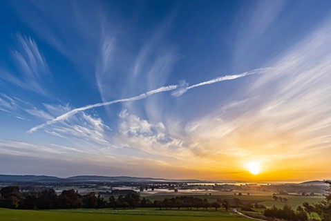 Sunrise at Lake Constance nature reserve Zeller Aachried with autumn fog