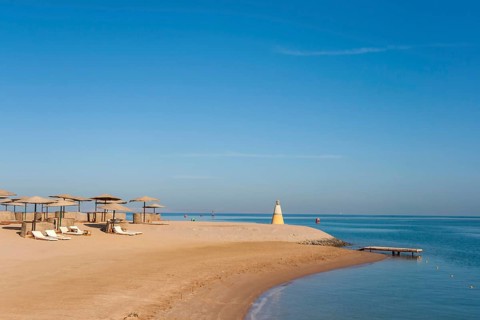 Parasol and sun loungers