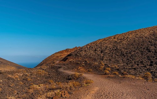 Trail reaching the Crater of the Teneguia volcano from the route of the volcanoes