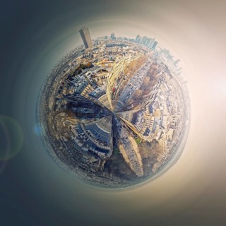 Aerial Paris as a micro planet in space. Sightseeing city panorama in shape o a globe with view to La Defense metropolitan district