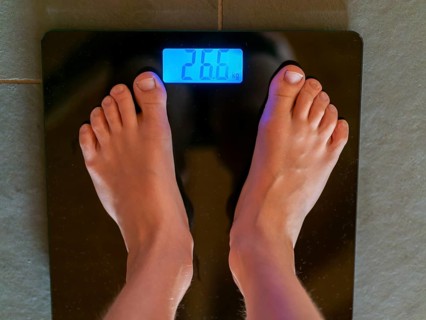 Children's feet on personal scale