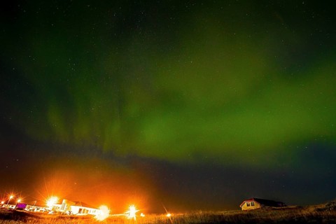 Green lights of the beautiful Northern Lights on the Reykjanes peninsula in southern Iceland
