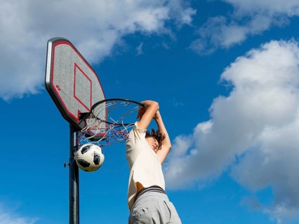Basketball Jump with the ball to the basket and net