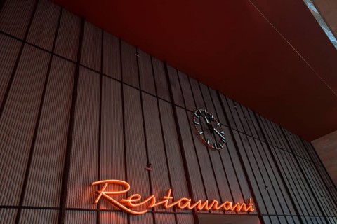 The historic lettering of the restaurant in the main hall of the former Tempelhof Airport