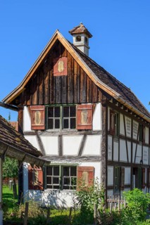Half-timbered house with brick chimney in the Swabian Open Air Museum