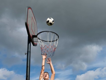 Basketball Jump with the ball to the basket and net
