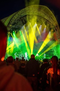 Cheering crowd at Live Klostersommer Festival in Historic Monastery