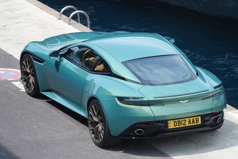 Aston Martin DB12 sports car in turquoise